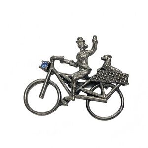 Vintage Silver Plated Women On Bicycle and Puppy On Back Pin Brooch w blue gem